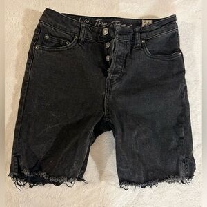 Free People black denim shorts